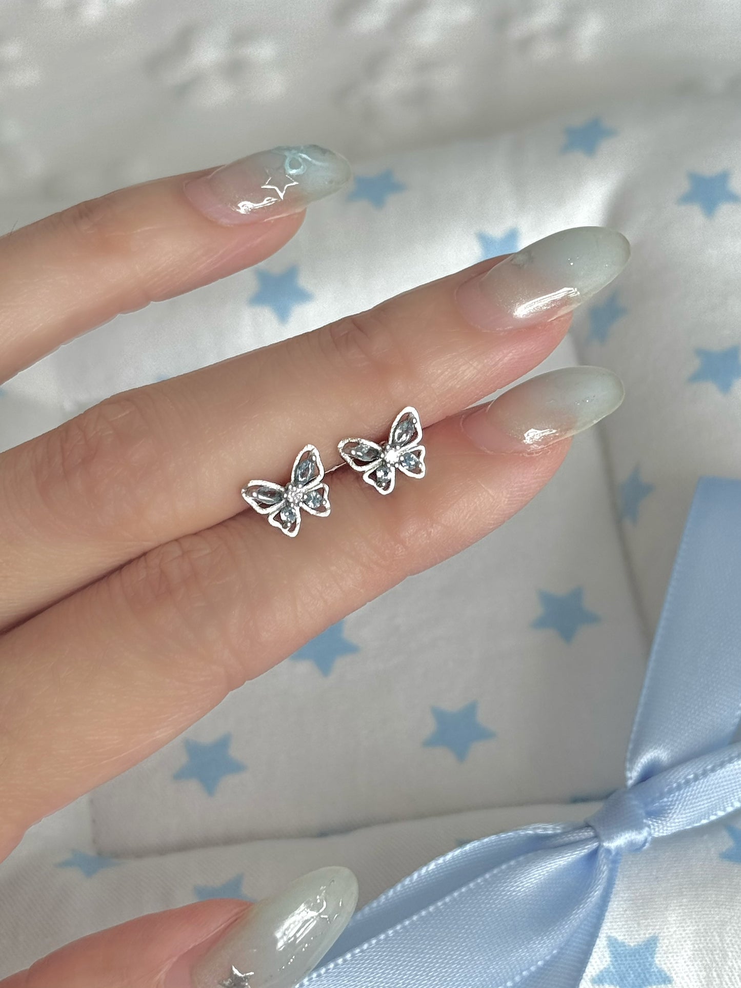 LolaWhite "Butterfly's Prayer" Ice Blue Butterfly & Cross Ear Studs
