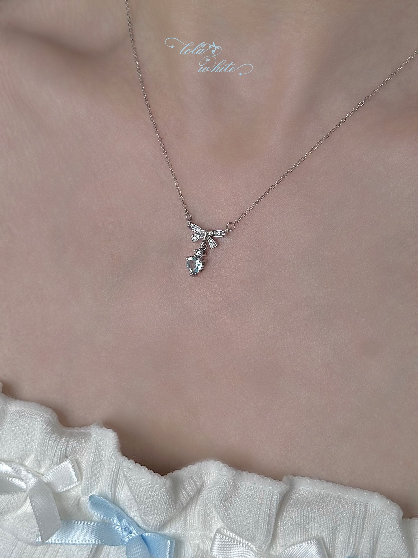 LolaWhite "Guardian Angel" S925 Sterling Silver Blue Topaz Heart Pendant Necklace