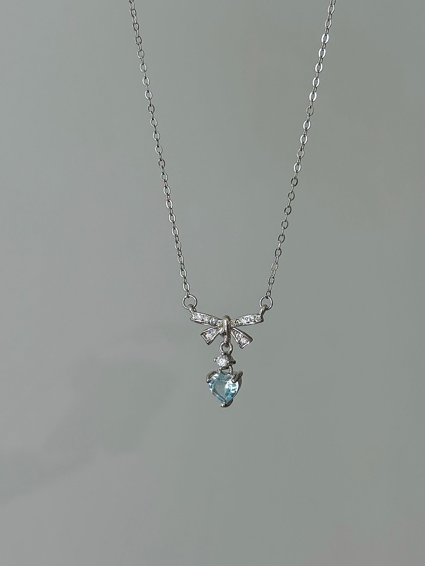 LolaWhite "Guardian Angel" S925 Sterling Silver Blue Topaz Heart Pendant Necklace
