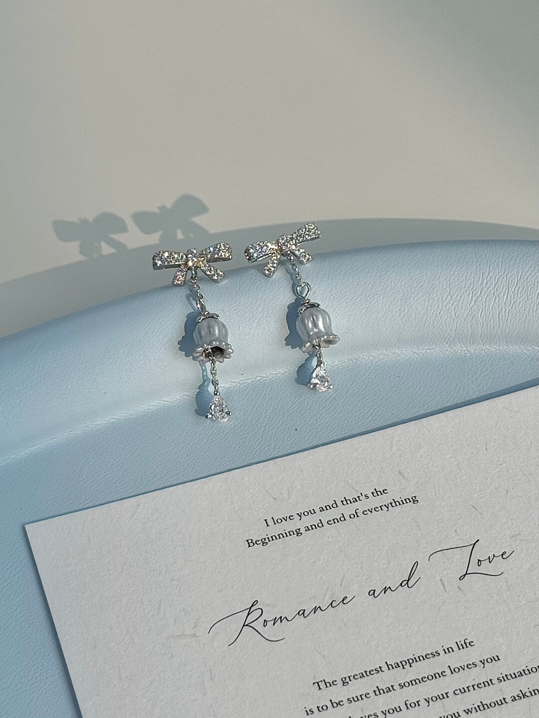 DearLola "Celestial Snowbell" Solid S925 Sterling Silver Lily of the Valley & Bow Earrings - Luxurious Ear Studs