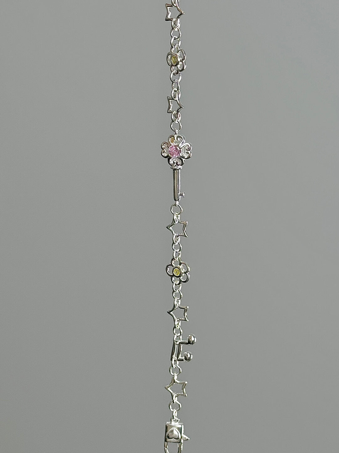 LolaWhite "Lucky Melody" S925 Sterling Silver Bracelet with Four-Leaf Clover, Key, Flower & Music Note Charms - Unique & Symbolic