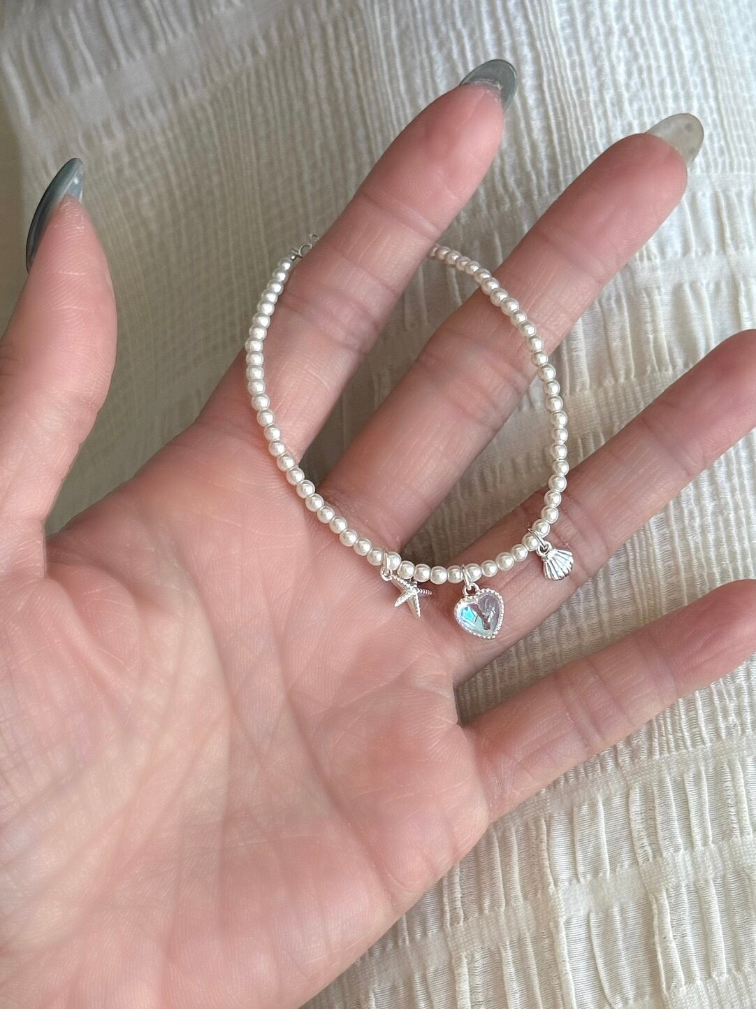 LolaWhite "Halo Lover" Solid S999 Pure Silver Iridescent Heart Bracelet with Starfish, Shell and Pearl Accents - Ethereal & Romantic