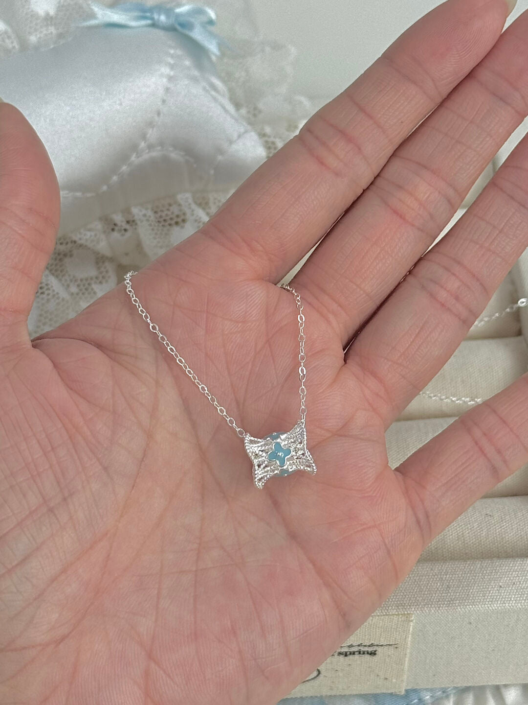 LolaWhite "Kiss of Dolphin Bay" S925 Sterling Silver Lace Hem Pass-Through Pendant Necklace