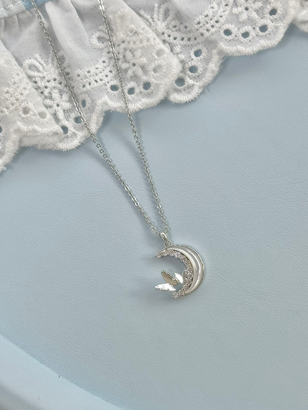 LolaWhite "Butterfly Gathering Moonlight" Designer Butterfly Zircon & Mother-of-Pearl Moon Necklace (Silver Plated)