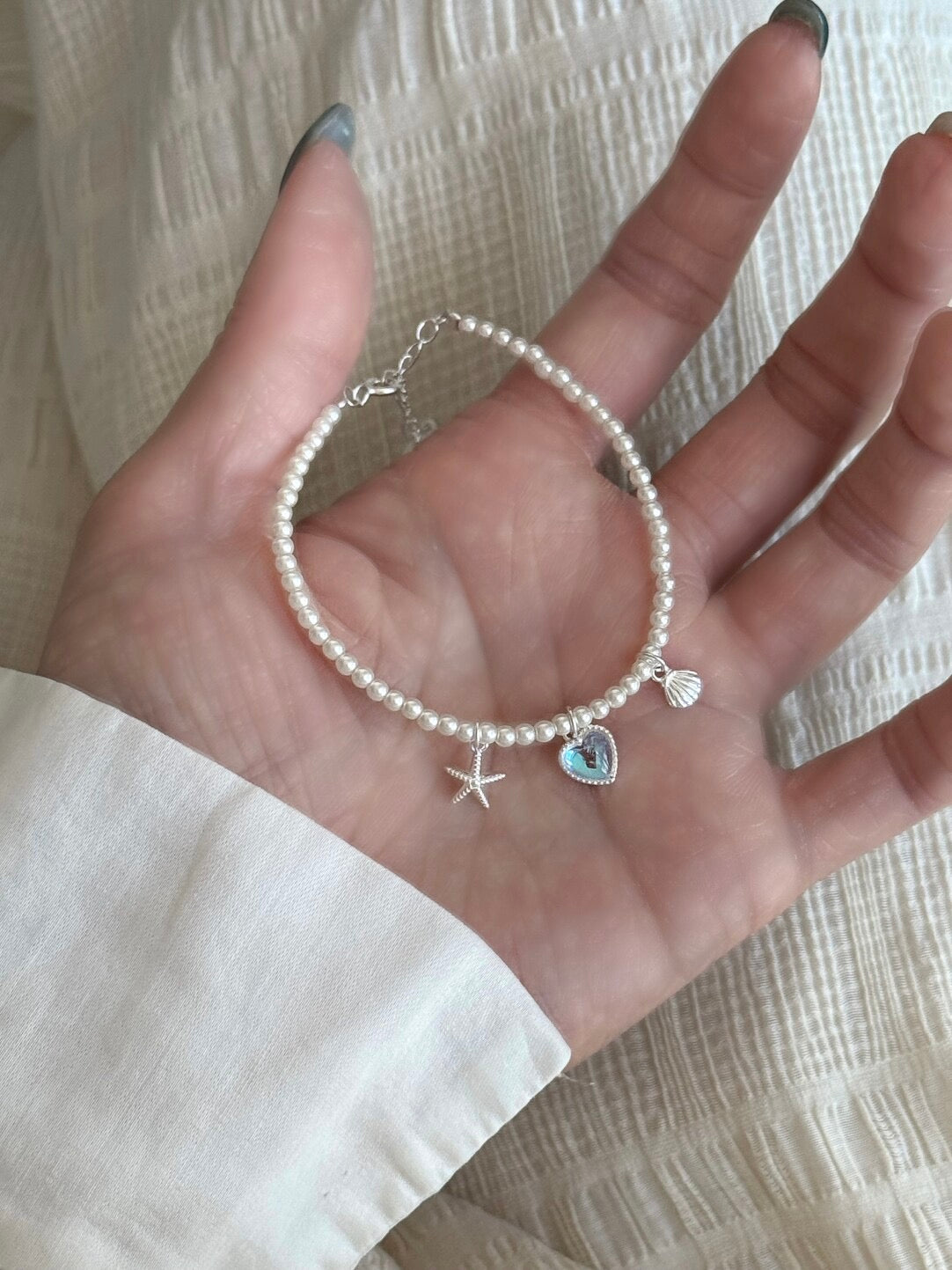 LolaWhite "Halo Lover" Solid S999 Pure Silver Iridescent Heart Bracelet with Starfish, Shell and Pearl Accents - Ethereal & Romantic