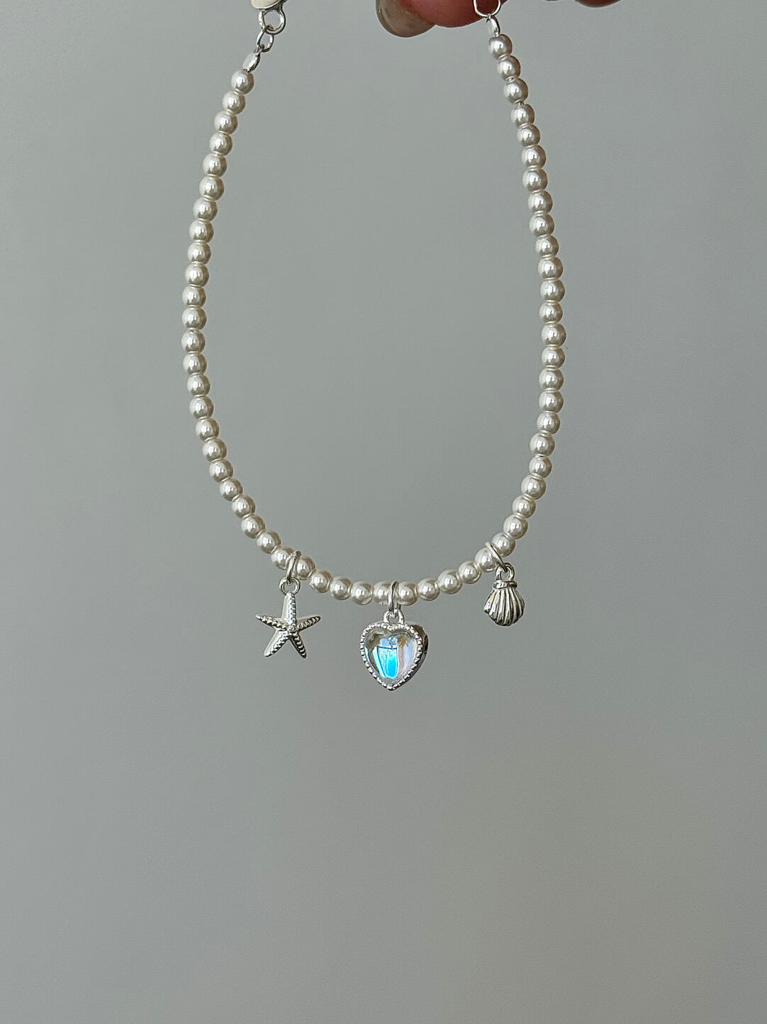 LolaWhite "Halo Lover" Solid S999 Pure Silver Iridescent Heart Bracelet with Starfish, Shell and Pearl Accents - Ethereal & Romantic