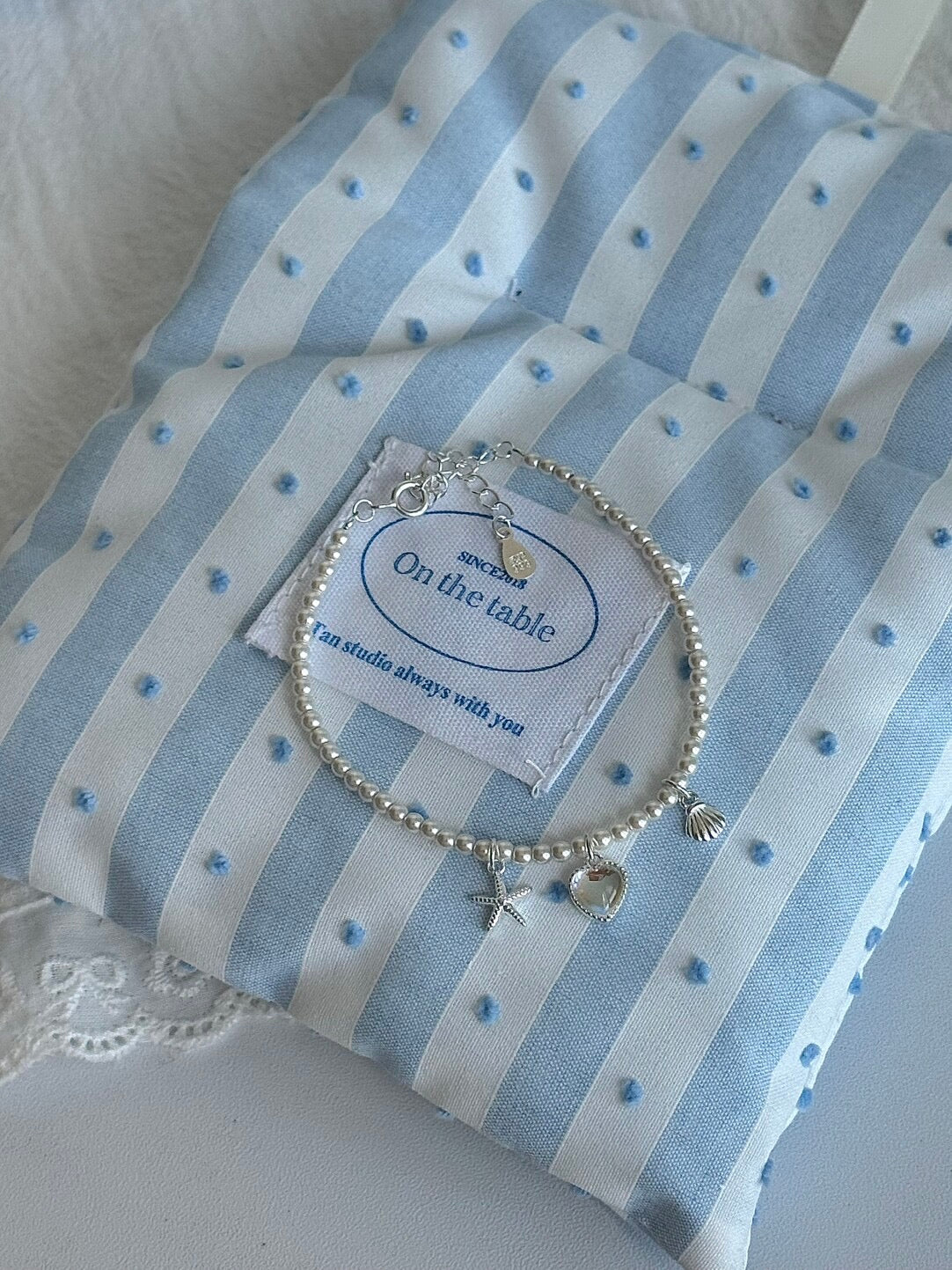 LolaWhite "Halo Lover" Solid S999 Pure Silver Iridescent Heart Bracelet with Starfish, Shell and Pearl Accents - Ethereal & Romantic