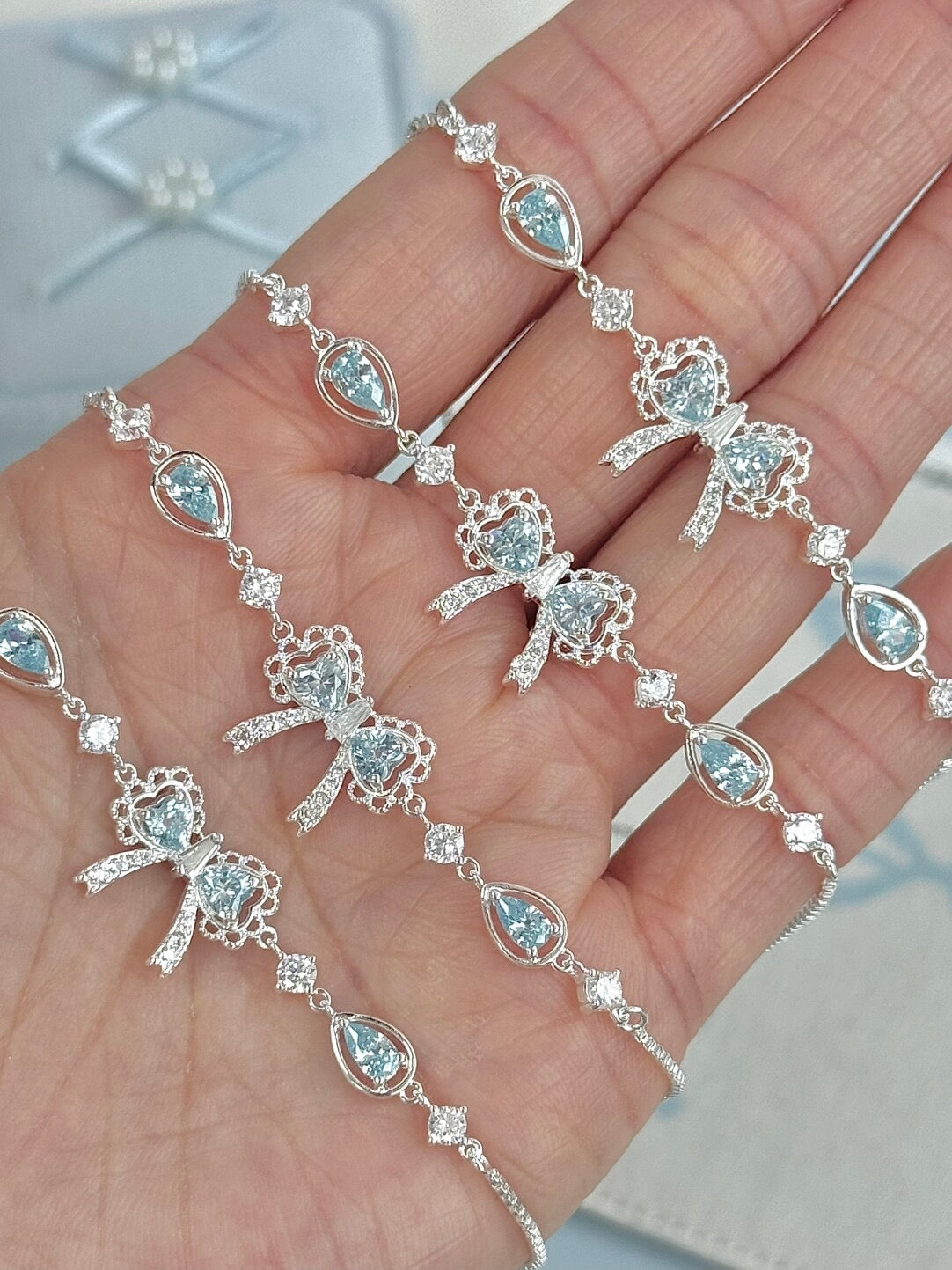 LolaWhite "Lingering Rainlight" Blue Zircon Lace Bow Bracelet – Silver Plated, Dazzling & Sweet