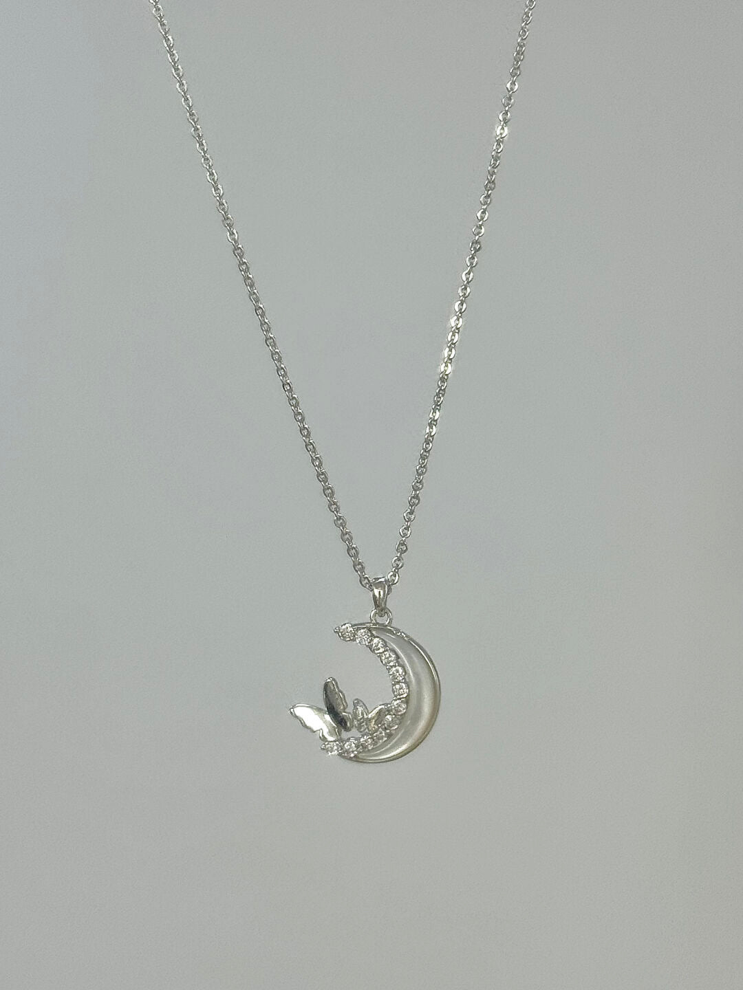 LolaWhite "Butterfly Gathering Moonlight" Designer Butterfly Zircon & Mother-of-Pearl Moon Necklace (Silver Plated)