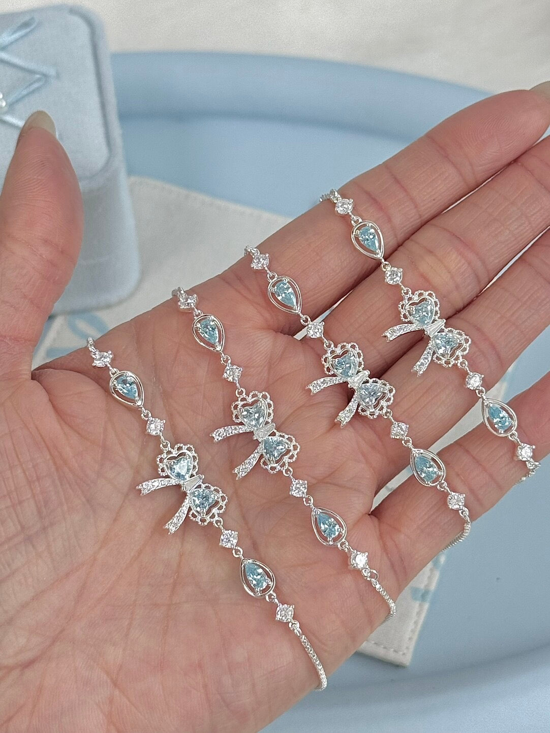 LolaWhite "Lingering Rainlight" Blue Zircon Lace Bow Bracelet – Silver Plated, Dazzling & Sweet