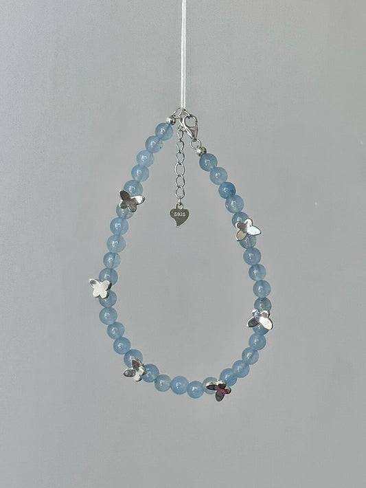 롤라화이트 "프로스트윙 버터플라이" 천연 아쿠아마린 스털링 실버 팔찌 | 차가움의 우아함