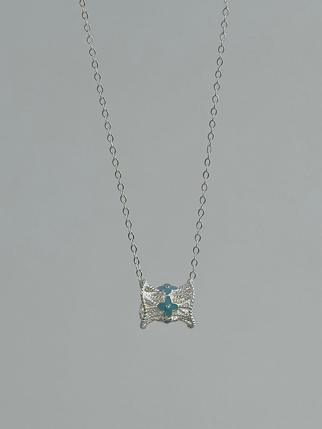 LolaWhite "Kiss of Dolphin Bay" S925 Sterling Silver Lace Hem Pass-Through Pendant Necklace